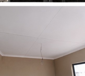 Installed ceiling with cornice